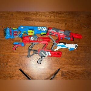 Lot of BoomCo toy blasters with targets, face guards and ammo belts